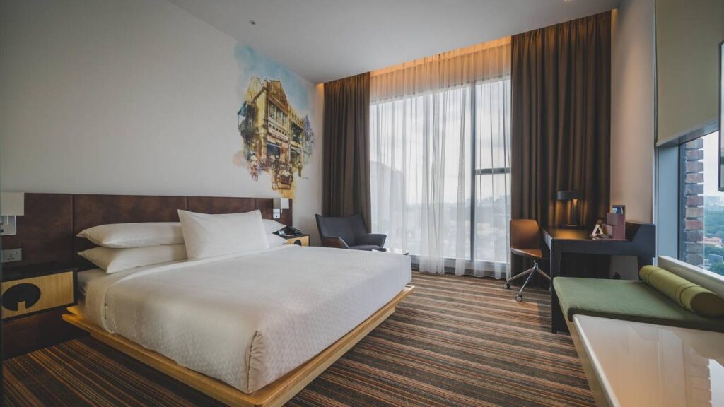 A photo of a hotel room sporting sleek, contemporary furnishings